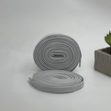 Luxury flat laces in silver for Air Jordan, Adidas Originals, Puma, On Cloud, and Nike trainers