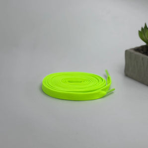 Neon green flat laces for AJ1, Nike Dunk, Vans, and Yeezy sneakers — hype streetwear style