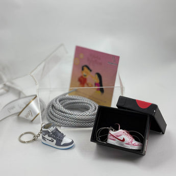Rakhi gift hamper with sneaker keychain, lace and pendant
