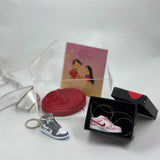 Rakhi gift hamper with sneaker keychain, lace and pendant
