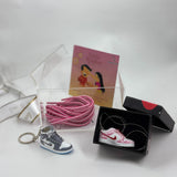 Rakhi gift hamper with sneaker keychain, lace and pendant
