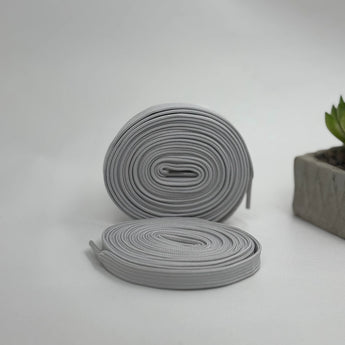 Luxury flat laces in silver for Air Jordan, Adidas Originals, Puma, On Cloud, and Nike trainers